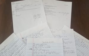 typed and handwritten poem drafts